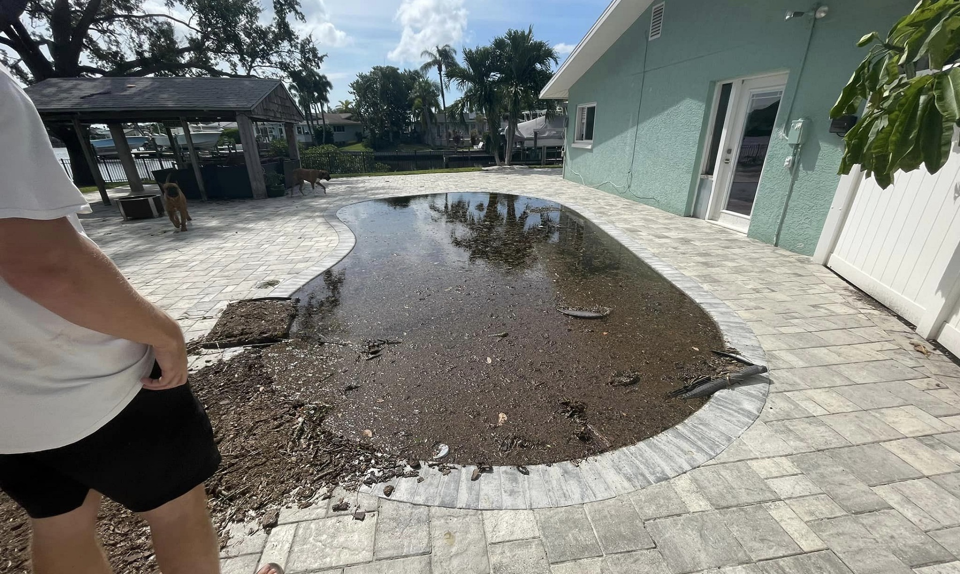 An image of a pool with seawater damage.