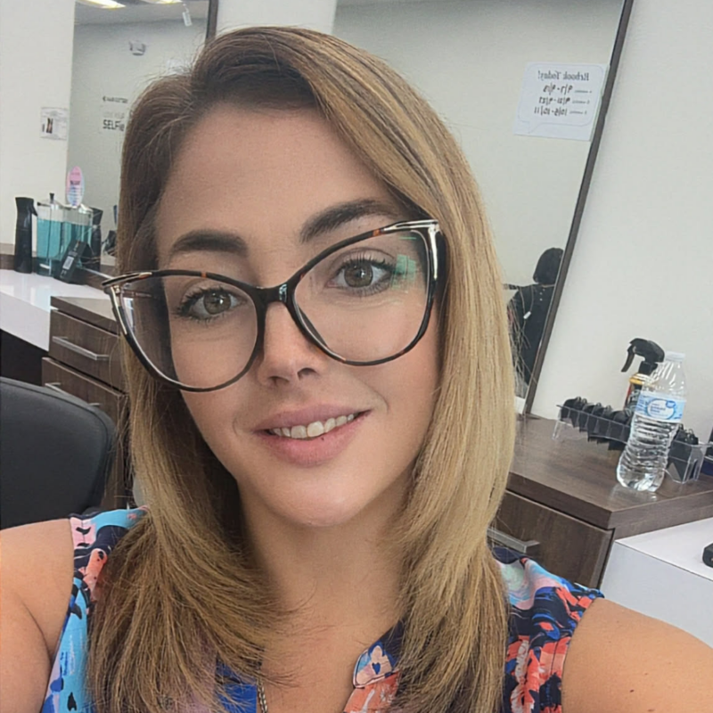 Ashley, Barber at Uptown Barbershop in St. Petersburg, FL